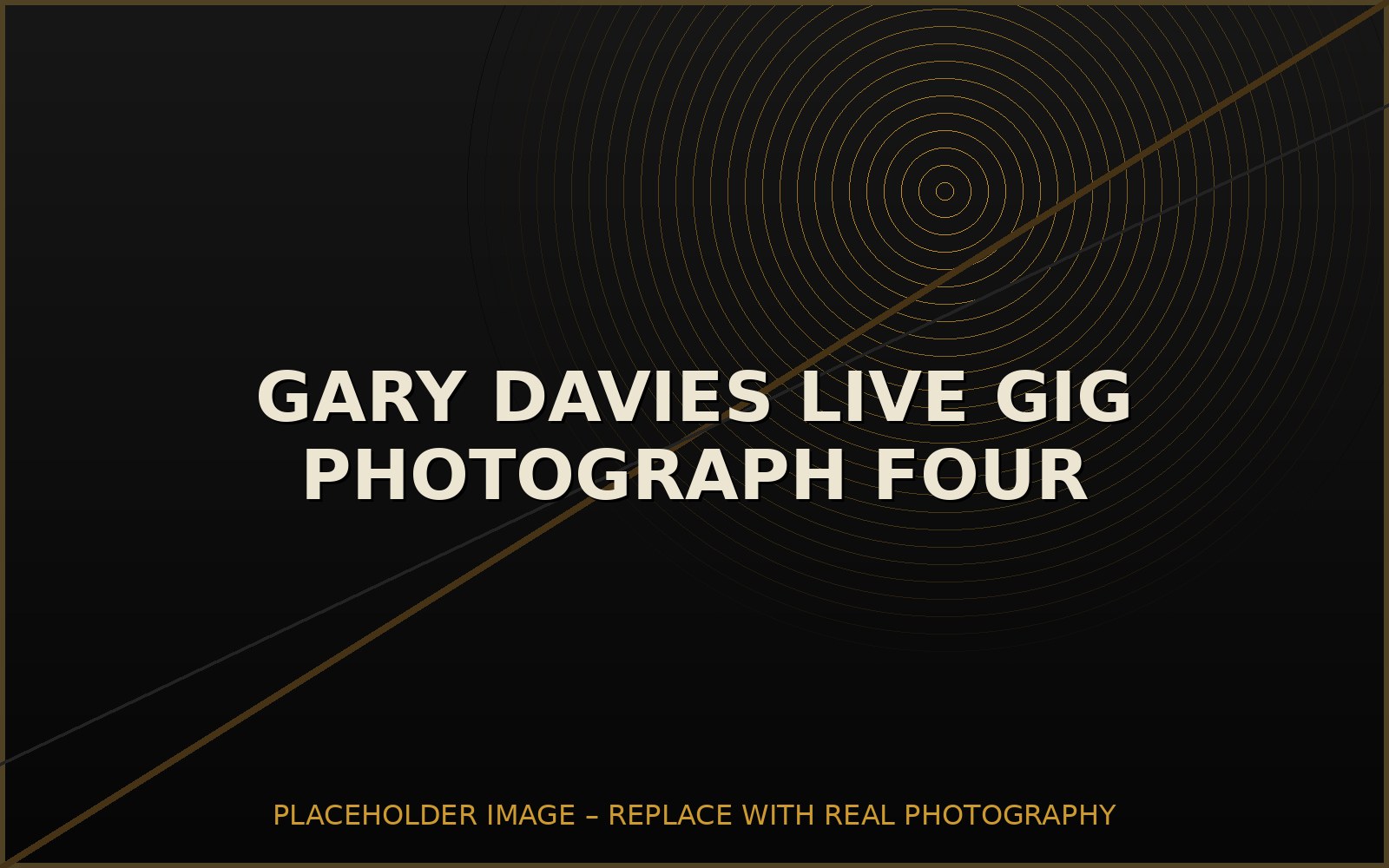 Gary Davies performing under stage lighting